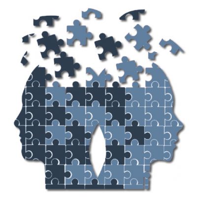 Two head silhouettes made of puzzle pieces, representing biofeedback